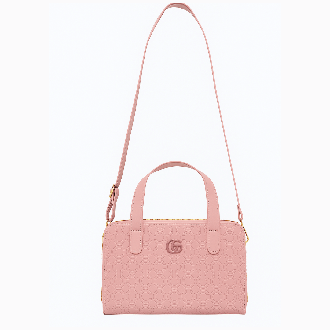 pink handbag with shoulder strap